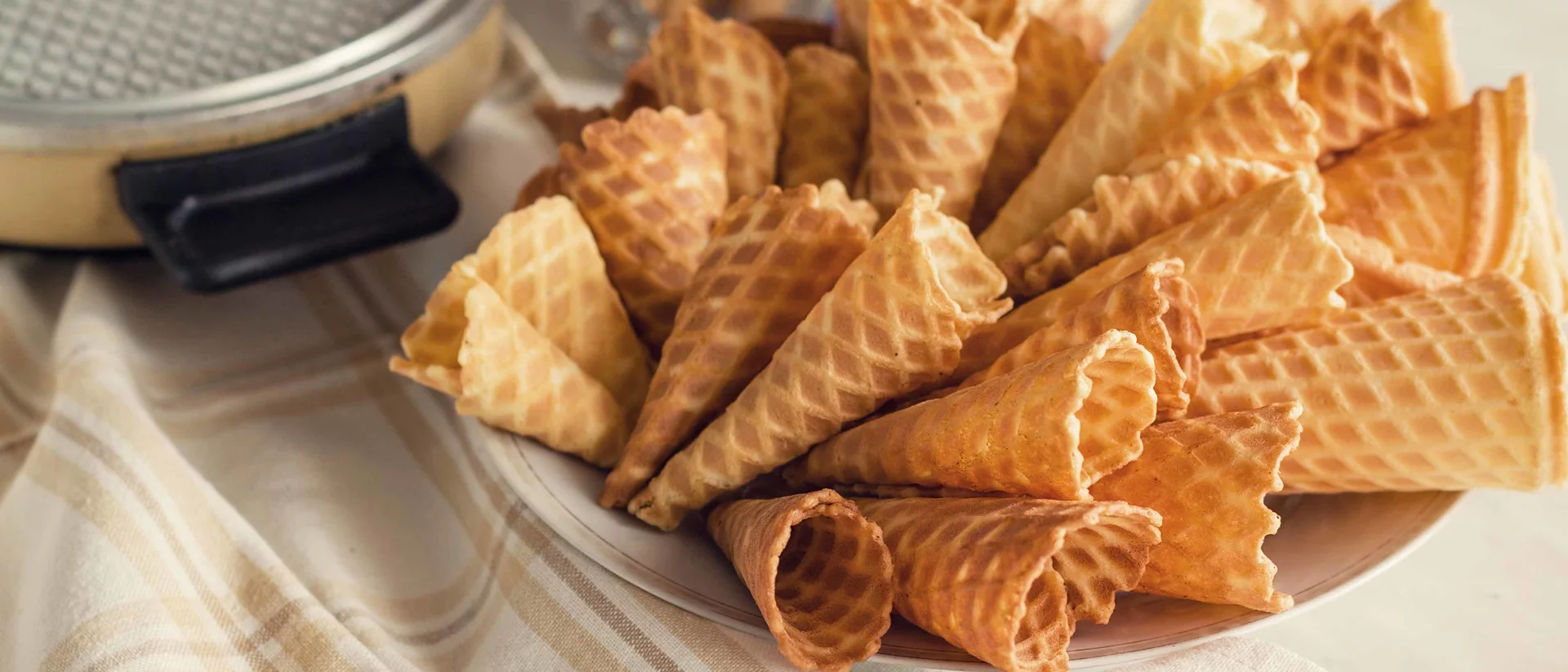 Homemade waffle cones on a table